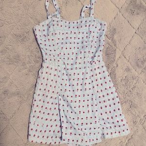 Unique vintage baby blue strawberry print romper.